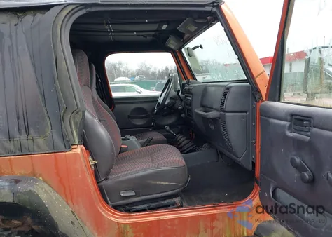 2000 Jeep Wrangler Sport z USA, uszkodzony, nr VIN 1J4FA49S0YP802693